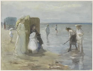 Udsigt langs højvandslinjen på Scheveningen strand, med to damer og børn
