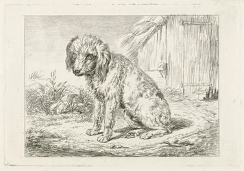 Siddende hund ved en lade
