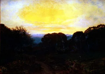 En gartner graver en kålplads ved solnedgang