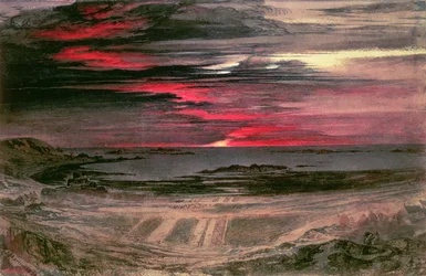 Solnedgang over en klippefyldt bugt