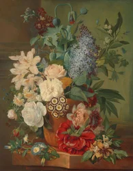 Blomster i en terracotta-vase