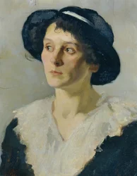 Dame i sort hat