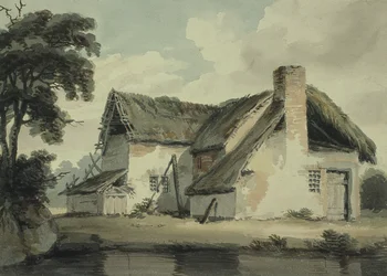 Stråtækt sommerhus nær en dam