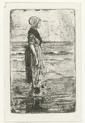 Stående kvinde på stranden