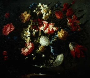 Tulipaner, nelliker og narcisser i en glasvase