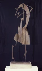 Kvinde arrangerer sit hår, 1929-30 (metal)