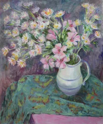 Lyserøde blomster i en kande