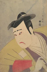 Skuespilleren Ichikawa Yaozo III holder en rød fan, 1794.