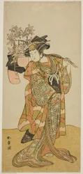 Skuespilleren Yamashita Kinsaku II som Odai, en Eboshi (hatte)-sælger, i skuespillet Hana-zumo Genji Hiiki, opført på Nakamura Theatre i den ellevte måned, 1775