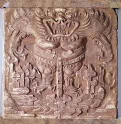 Koreansk kunst: grå terrakottasten med en fremstilling af et monster. Kongeriget Baekje (også Paekche eller Paikchei), Korea. 7. århundrede. Koreas Nationalmuseum
