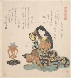 Kvinde, der spiller tsuzumi