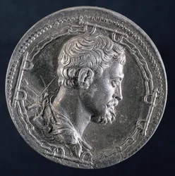 Bagsiden af medaljonen af Andrea Doria forestiller kunstneren omgivet af lænker af en fange og med en kabys i baggrunden, ca. 1541 (sølv) (se 122337 for forside)