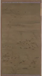 Gæs, der stiger ned på Sand