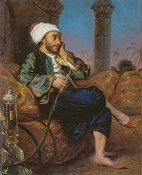 En egyptisk mand, der ryger vandpibe