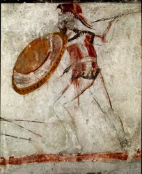 En kriger med et spyd og et skjold Lucanian fresko fra det 4. århundrede f.Kr., fra Rytterens grav, Paestum, Italien. Museo nazionale archeologico, Paestum