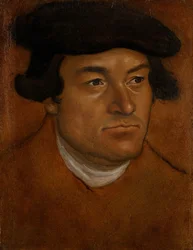 Portræt af en mand i sort kasket