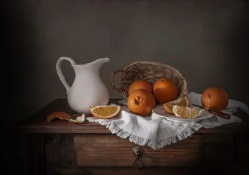 Rustikt stilleben med appelsiner