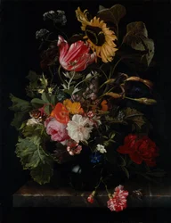 En buket blomster i en vase