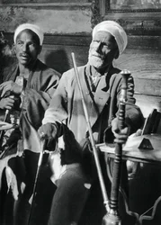 Smoking the narghileh, Cairo, 1937