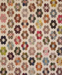 Detalje af et patchwork sengetæppe (tekstil)