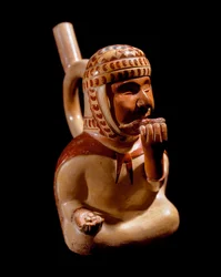 Præcolombiansk kunst, Mochique civilisation (grim, Mochica): antropomorf vase, der repræsenterer en blind tigger, der spiller et musikinstrument (panfløjte?). 200 f.Kr.-700 e.Kr. Lima, Nationalmuseet for antropologi og arkæologi, Peru - præcolumbiansk kuns