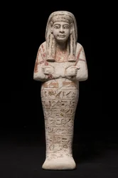 Ushabti for en kvinde ved navn Wia, Ramesside-perioden (kalksten)