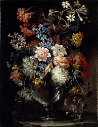 Blomster i en vase på en afsats
