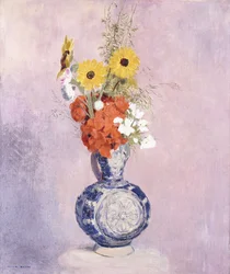 Buket blomster i en blå vase,