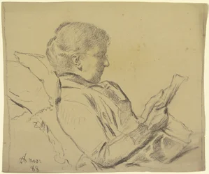 Luise Scholderer, der læser avis