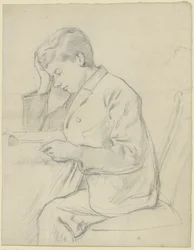 Victor Scholderer læser ved bordet