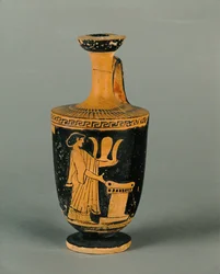 Kvinde ved et alter. Lille, rødfiguret lekythos ...