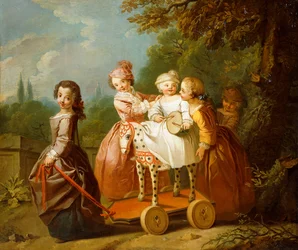 En ung dreng på en hobbyhest med andre børn, der leger i en have,