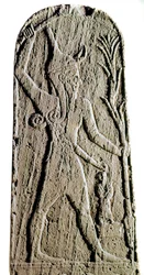Fønikisk kunst: kalkstensstele af guden Baal i lyn. (Gud kriger beskytter kongen) Skulptur fra det 19. eller 18. århundrede f.Kr.,. Fra Ras Shamra (Ugarit eller Ougarit) Dim 142 cm Paris, Musee du Louvre