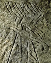 Forhistorie, klippekunst: helleristning (graffiti på sten) af en repræsentation af en menneskelig figur. neolitikum, stenalder. (Aserbajdsjan) Bronzealder. Baku, Aserbajdsjans statsreligionshistoriske museum