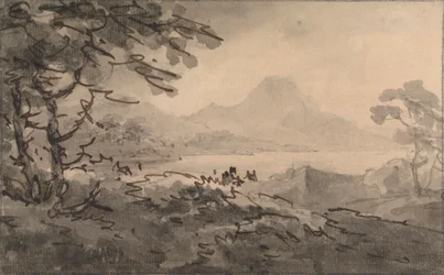 En sø med bjerge, der rejser sig hinsides