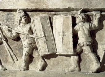 Romersk kunst: lavt relief, der repræsenterer et slag af gladiatorer. 1. århundrede e.Kr. Rom, Museo della Civilta Romana