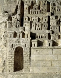 Romersk kunst: lavrelief, der repræsenterer en by. 2. århundrede e.Kr. (lavt relief)