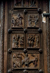 Romansk kunst: trædør fra midten af det 12. århundrede fra Sankt Maria im Kapitol-kirken i Köln, Tyskland. Scener med bebudelsen for hyrderne, fødslen, tilbedelsen af de vise mænd og th