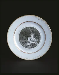 Hvid tallerken kantet i guld og rød med kvinde (porcelæn)