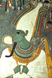Det gamle Egypten, Maleri, Osiris, Horemhebs grav, Theben, Gud for livet efter døden, underverdenen og de døde, Grøn i huden med faraoskæg, iført en krone med to store strudsefjer i hver side og med en symbolsk krumstav og slagvåben i hånden (foto)