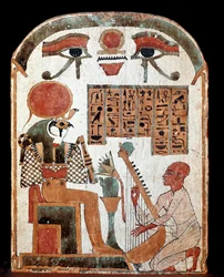 Egyptisk antikvitet: stele af harpisten Jedkhonsuiufankh i tilbedelse før den guddommelige Horus. Mellemperiode. 1069-664 f.Kr. Paris, musee du Louvre - Egyptiske antikviteter: stela af harpisten Djedkhonsouioufankh, der tilbeder guden Horus. Mellemste pr