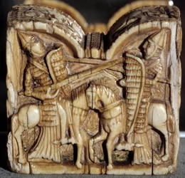 Romansk kunst: dambonde, der repræsenterer en kamp mellem to riddere. Elfenben skulptur. Fra Spanien. Svag. 0,64x0,68 m. Paris, Louvre-museet