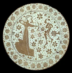 Dame trækker en sløjfe på en ung mand, hvis hals er krydset af en pil fajancefad af spansk produktion. Paris fra det 16. århundrede, Louvre-museet