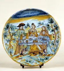 Repræsentation af en udendørs banket på en keramisk plade af Talavera de la reina (Spanien). Begyndelsen af 1500-tallet. Milano, Museo del Castello.