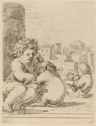 Barn leger med en hund.