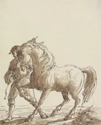 Mand, der leder en hest