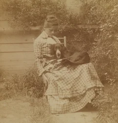 [Susan Macdowell (senere fru Thomas Eakins) med en setter]