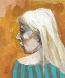 En eftertænksom blond kvinde