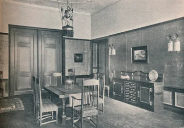En udsigt over en spisestue i en Berlin lejlighed, designet af M. H. Baillie Scott, c1909.