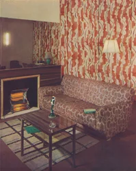 Hjørne af en lounge i en lejlighed i London af Ian Henderson, c1945